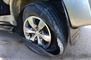 What to Do When a Truck Tire Blowout Hits Your Car